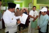 Jelang Pencoblosan Pilkada 2024, Pj Bahtiar Tinjau Tenaga Kesehatan di Majene, Layanan Gratis