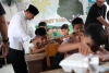 Uji Coba Makan Siang Bergizi Gratis di SD Inpres Puncak Mamuju dan Bagikan Alat Sekolah